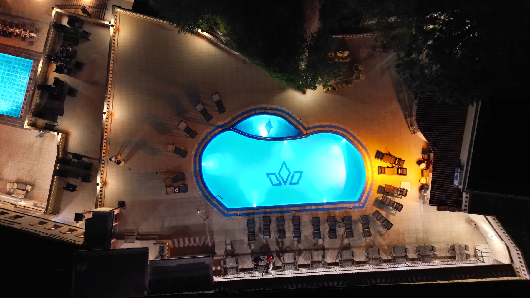 Burcu Kaya Hotel pool at night